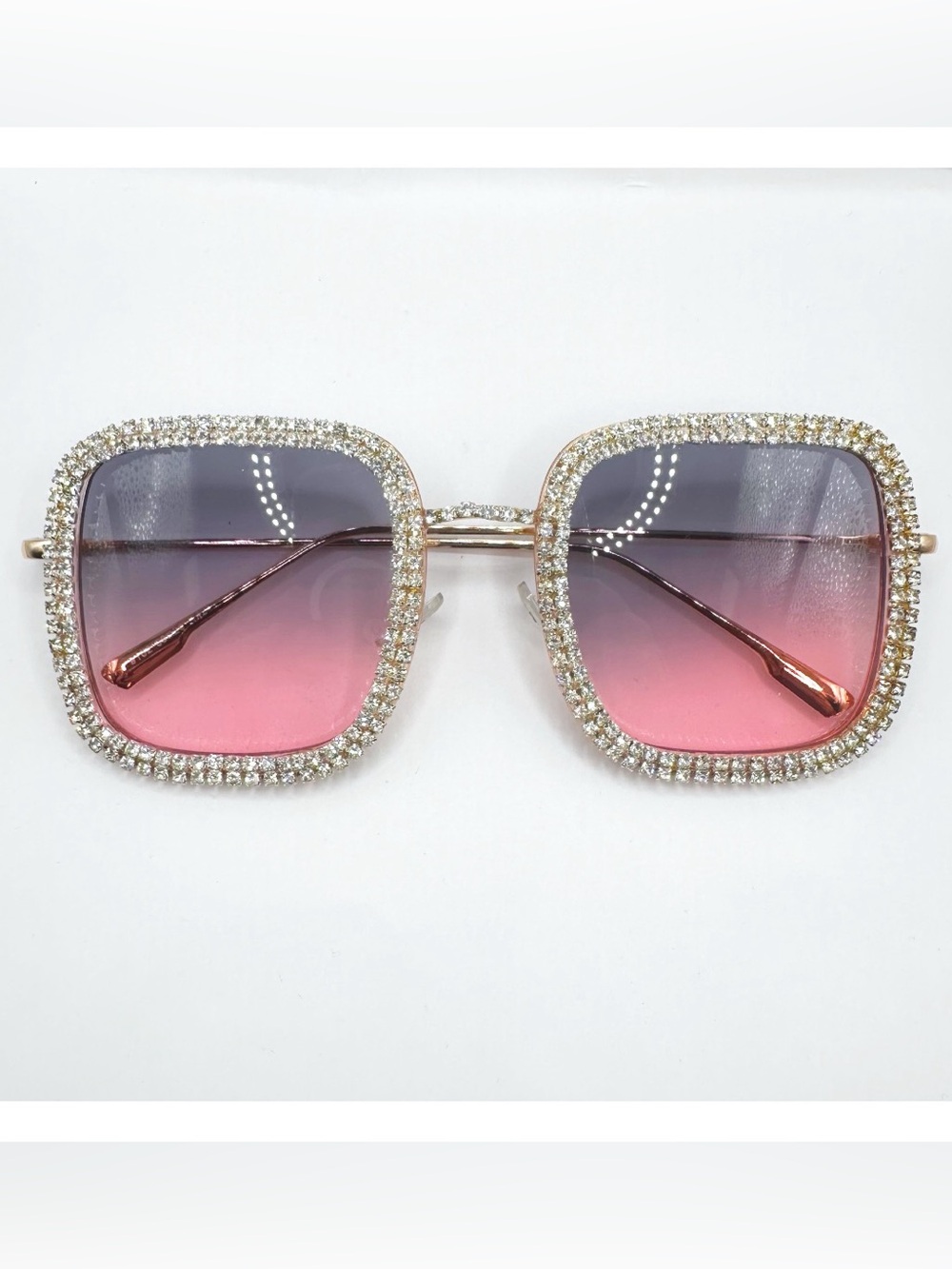 Square metal-rim sunglasses feature an eye-catching gradient purple-to-pink lens